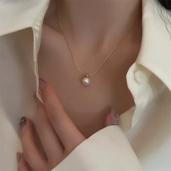 Bijoux-En-Gros-l-gant-Style-Simple-Rond-Acier-Au-Titane-Perles-Artificielles-Incruster-Pendentif (1) Pendentif Élégant
