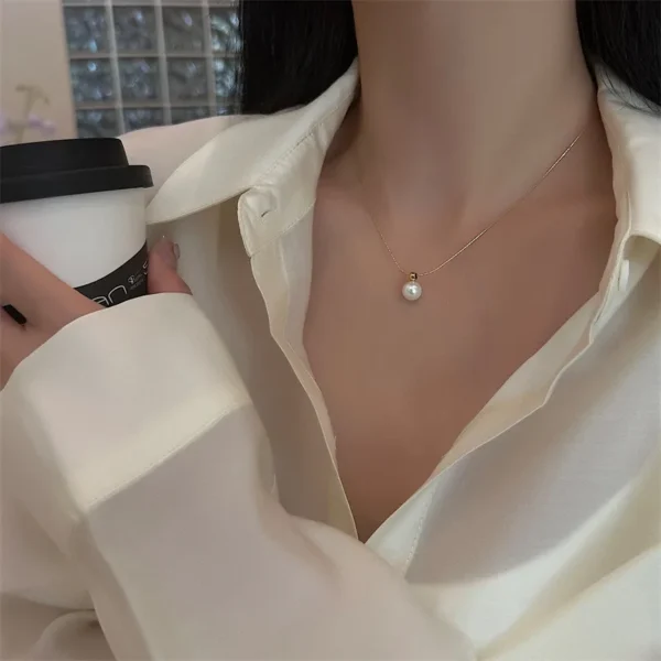 Bijoux-En-Gros-l-gant-Style-Simple-Rond-Acier-Au-Titane-Perles-Artificielles-Incruster-Pendentif (2) Pendentif Élégant